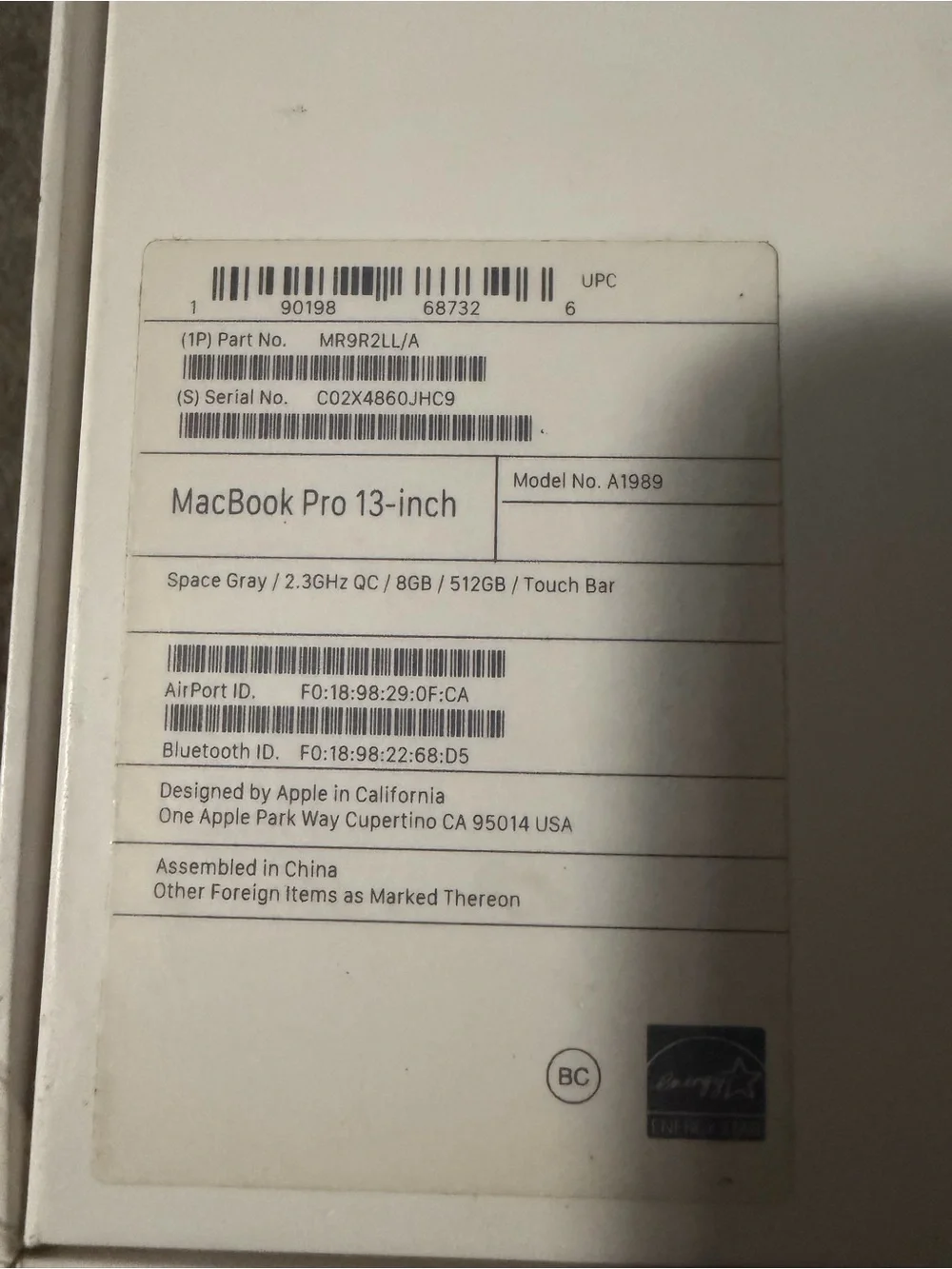 Apple Silver MacBook Laptop with Apple Logo